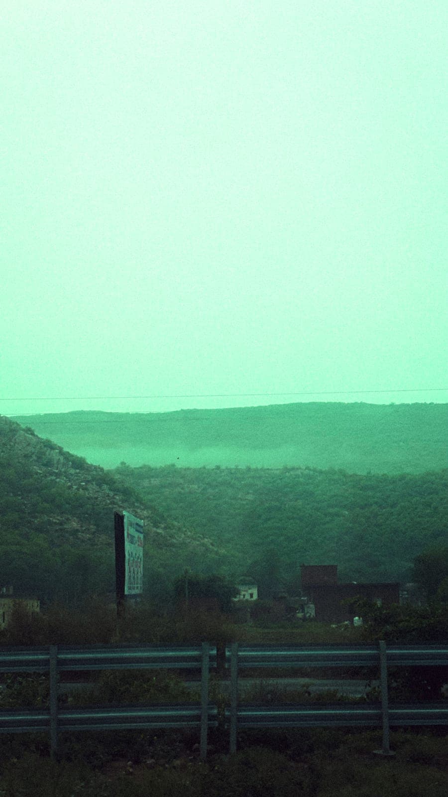 Green haze over the hills